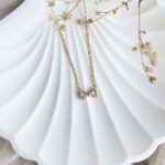 Anti-tarnish trendy delicate bow necklace – minimal waterproof jewellery for women.