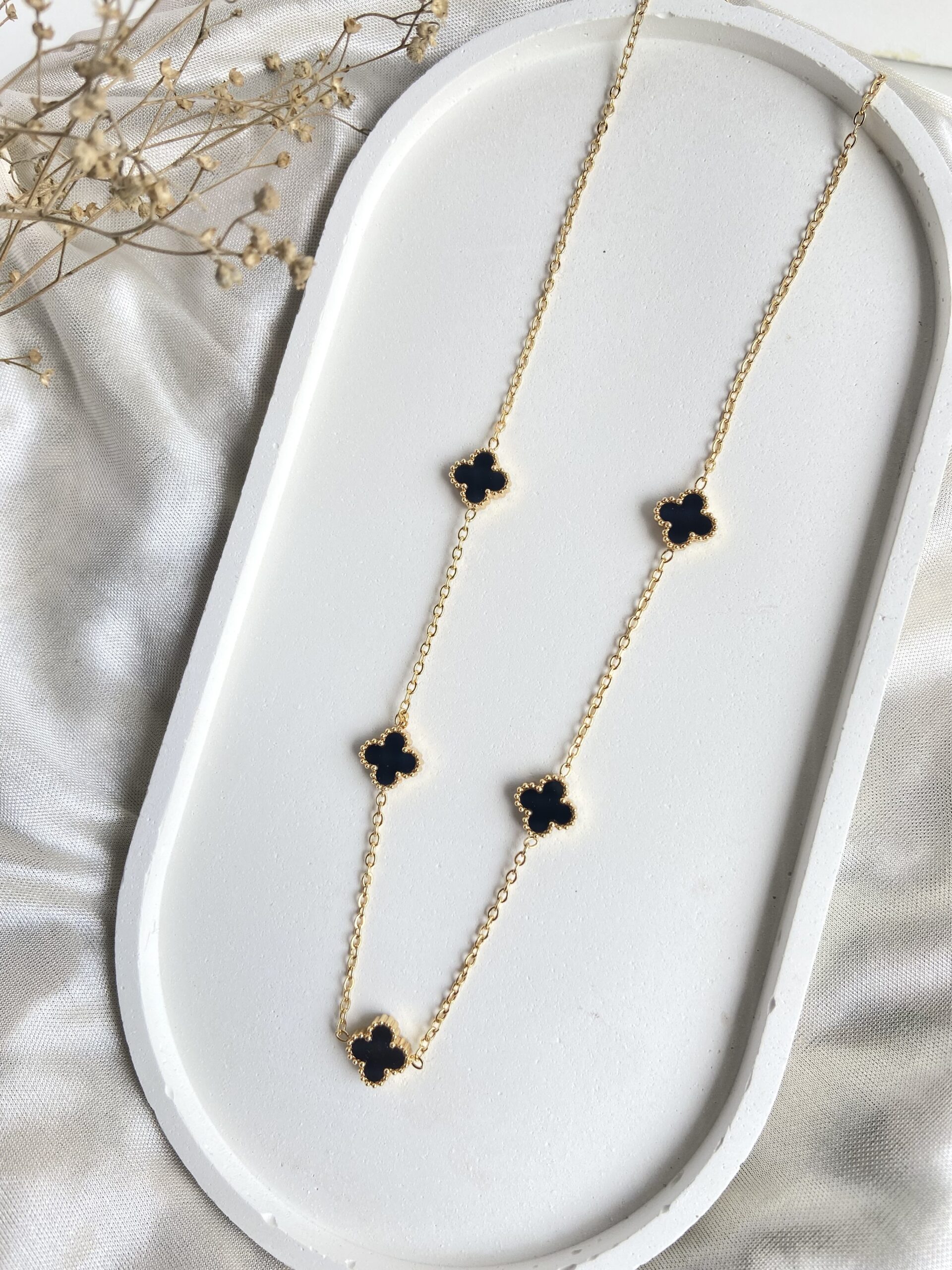black clover necklace